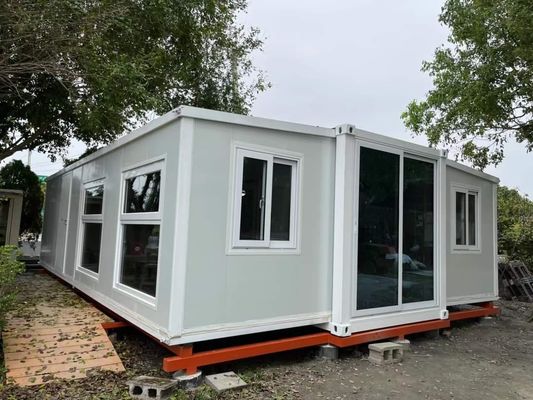 comprare Casa in container espandibile da 30 piedi con porta di sicurezza in acciaio Area di terra di 56 metri quadrati e opzioni di colore personalizzabili fabbricazione online